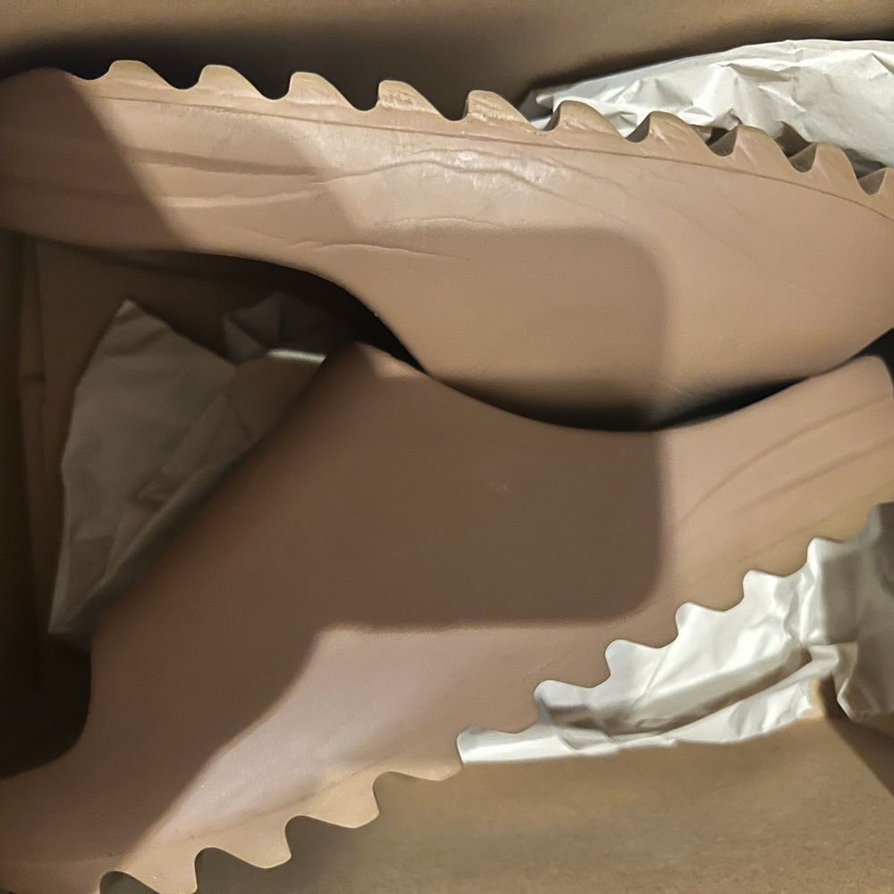 Authentic Preowned — Core Yeezy Slides. Mens Sz 10. Worn twice, good condition.